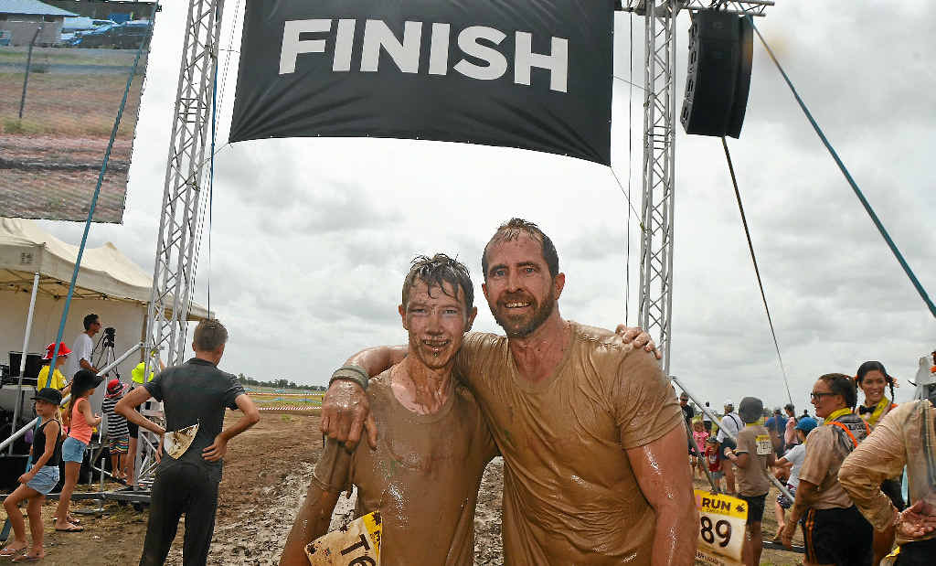 MUD RUN: Callum Williams and Mark Hurley at the end of the 5km Mud Run in Emerald. MUD RUN: Callum Williams and Mark Hurley at the end of the 5km Mud Run in Emerald.